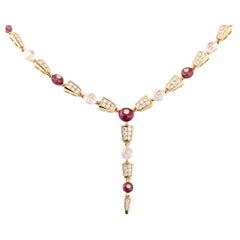 Bulgari Halskette aus 18 Karat Roségold mit Diamanten, Rubellit und Quarz
