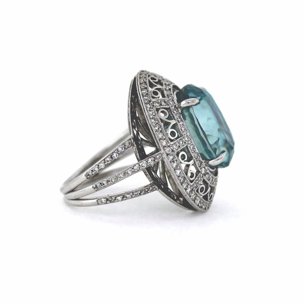 This Blue Zircon is HUGE and has an amazing deep color as seen in the images.  There are about .75tcw accent white diamonds and the Gallery on the inside spells 
