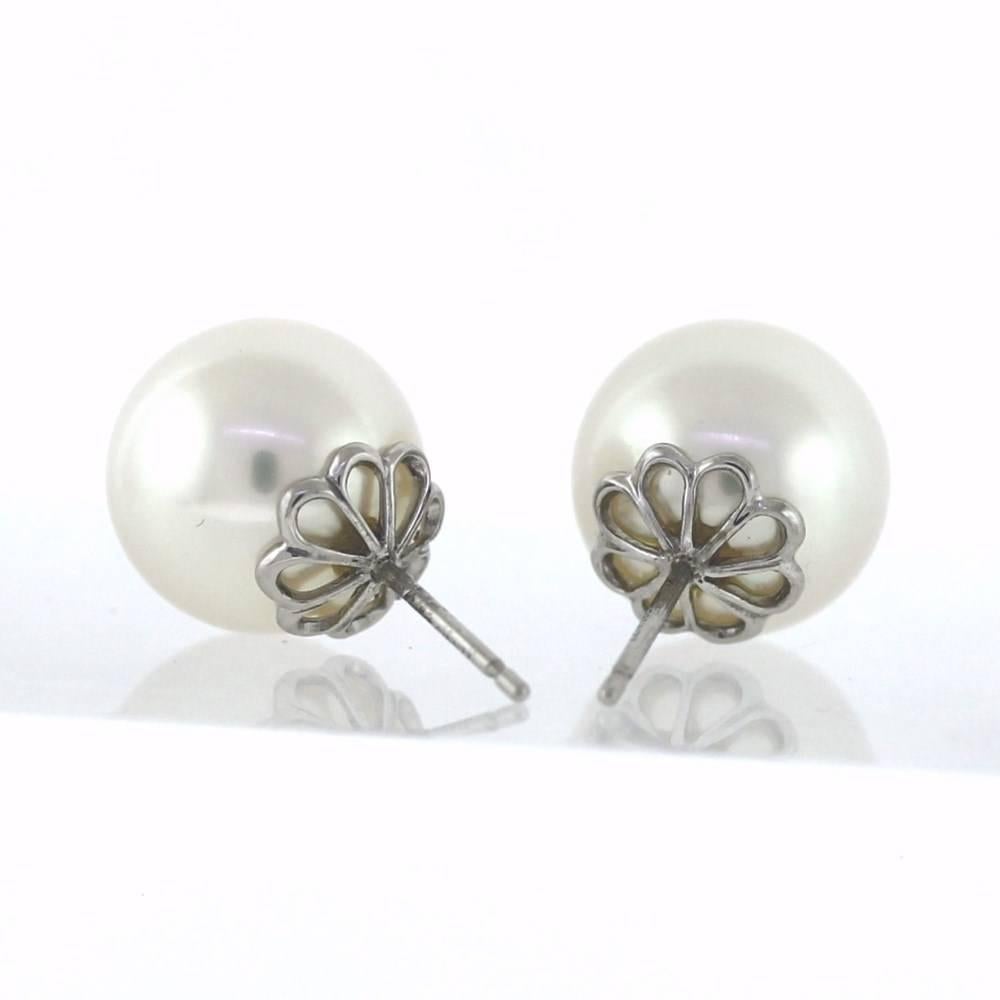...A perfect match, perfect quality, only by CARTIER!

CARTIER South Sea pearl stud earrings in Platinum. Two matching 13.65mm diameter pearls mounted on Platinum posts with 