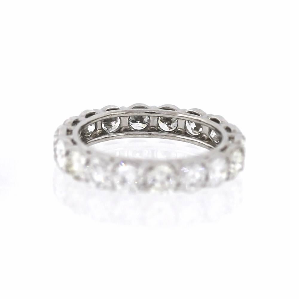 Set in platinum, this eternity band is an eye catcher.  Includes 18 diamonds  (3.36ctw) of round brilliant diamonds in the G color range and VS clarity range.  

Size 6 1/2, Can be re sized up or down 1 size if necessary.