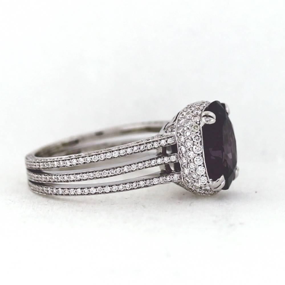 This super cool ring has a GIA lab report for the 4.44ct unheated Natural Purple Spinel, GIA 5171975907.  The 18K White Gold mounting is blanketed in diamonds 368 round weigh 1.35tcw. Size 6.5, sizable.