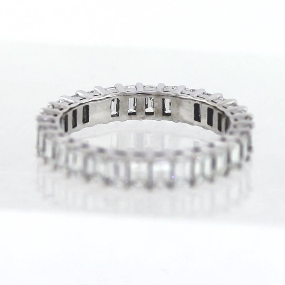 Hand Finished Eternity Band made in Platinum.  The band contains 30 Emerald Cut diamonds weighing a total of 2.89 carats.  On average, each diamond weights approximately .10ct.  The diamonds are F-G color (near colorless) and VS clarity.  This band