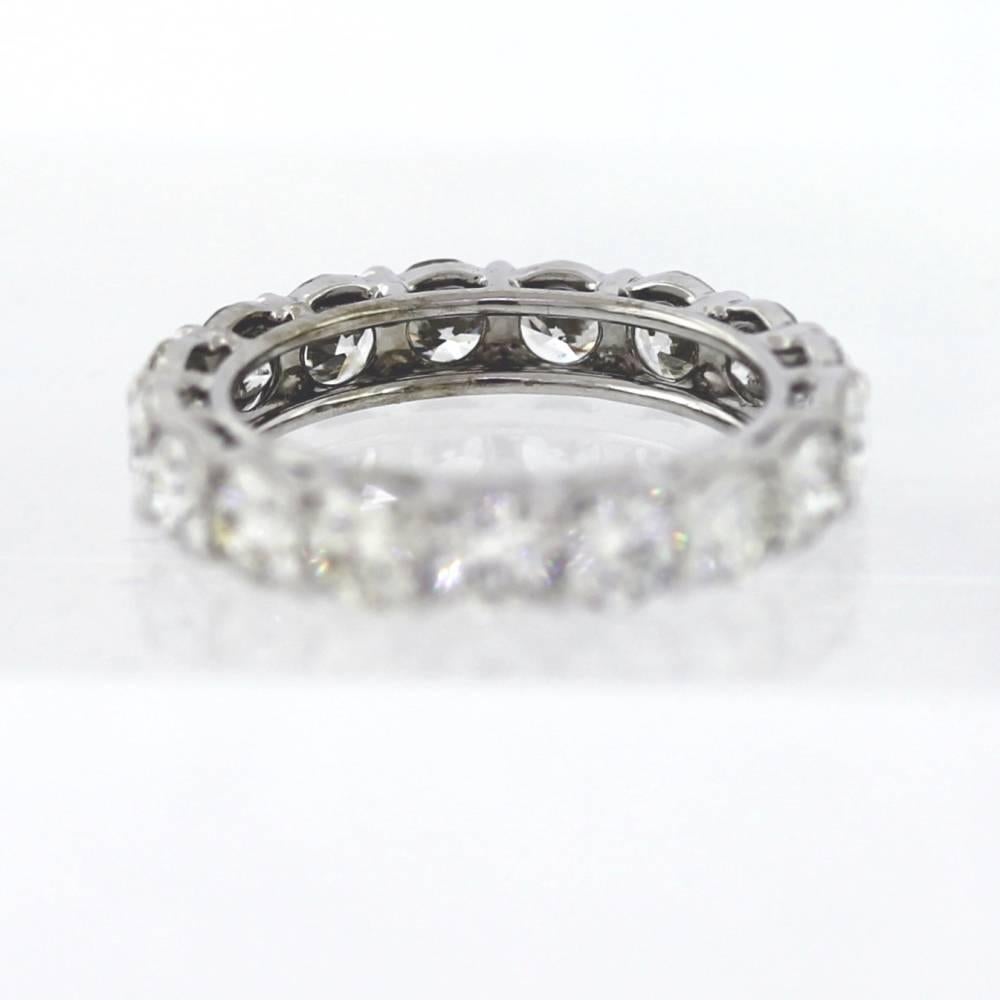 Hand Finished Eternity Band made in Platinum. The band contains 16 round brilliant cut diamonds weighing a total of 4.00 carats. On average, each diamond weights approximately .24ct. The diamonds are h-i color (near colorless) and VS clarity. This