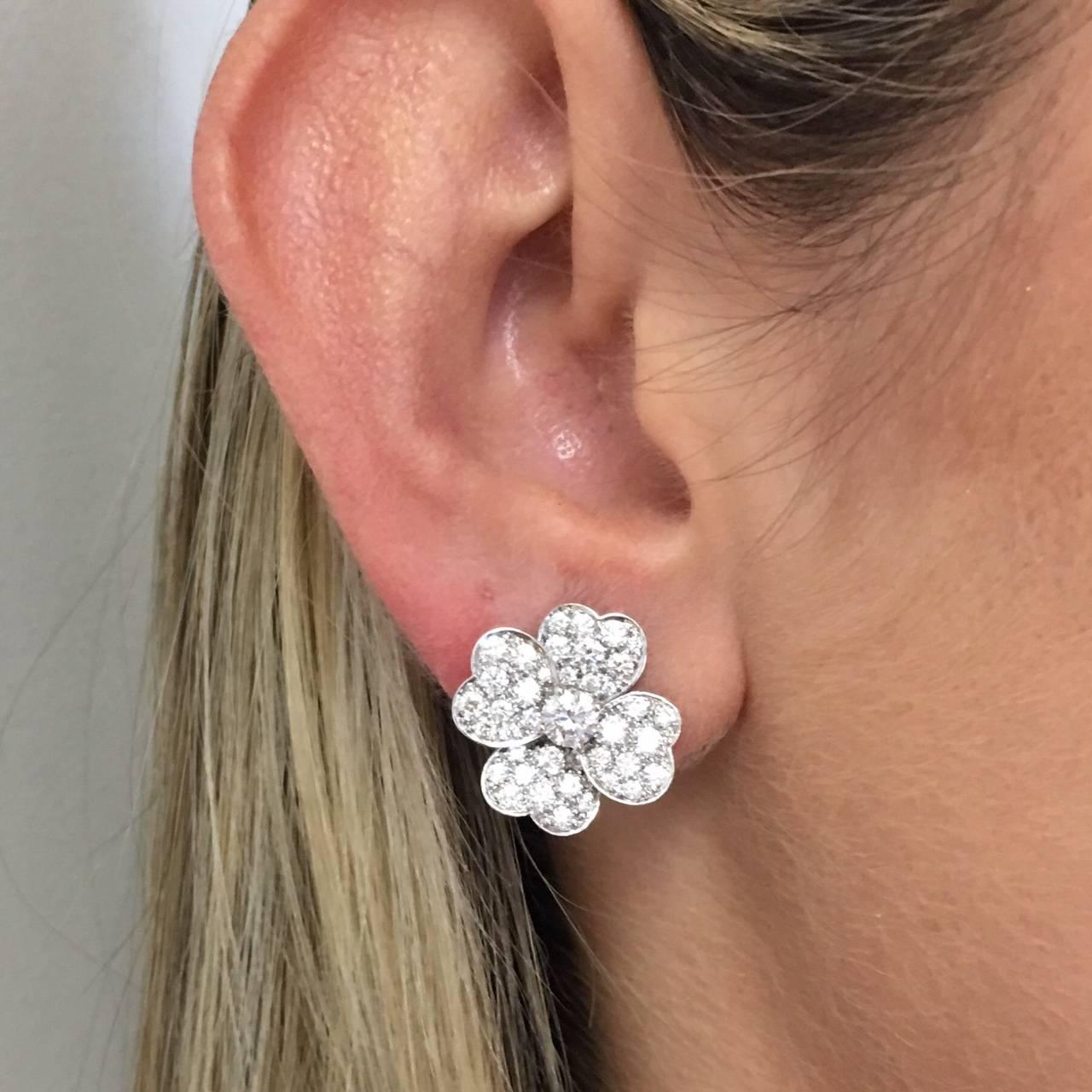 As new, mint condition Four Heart shape Petal Earrings by the great French designer Van Cleef & Arpels.  The earrings are part of the Cosmo Collection.
Composed of four heart-shaped petals,Cosmos is inspired by one of Van Cleef & Arpels' signature
