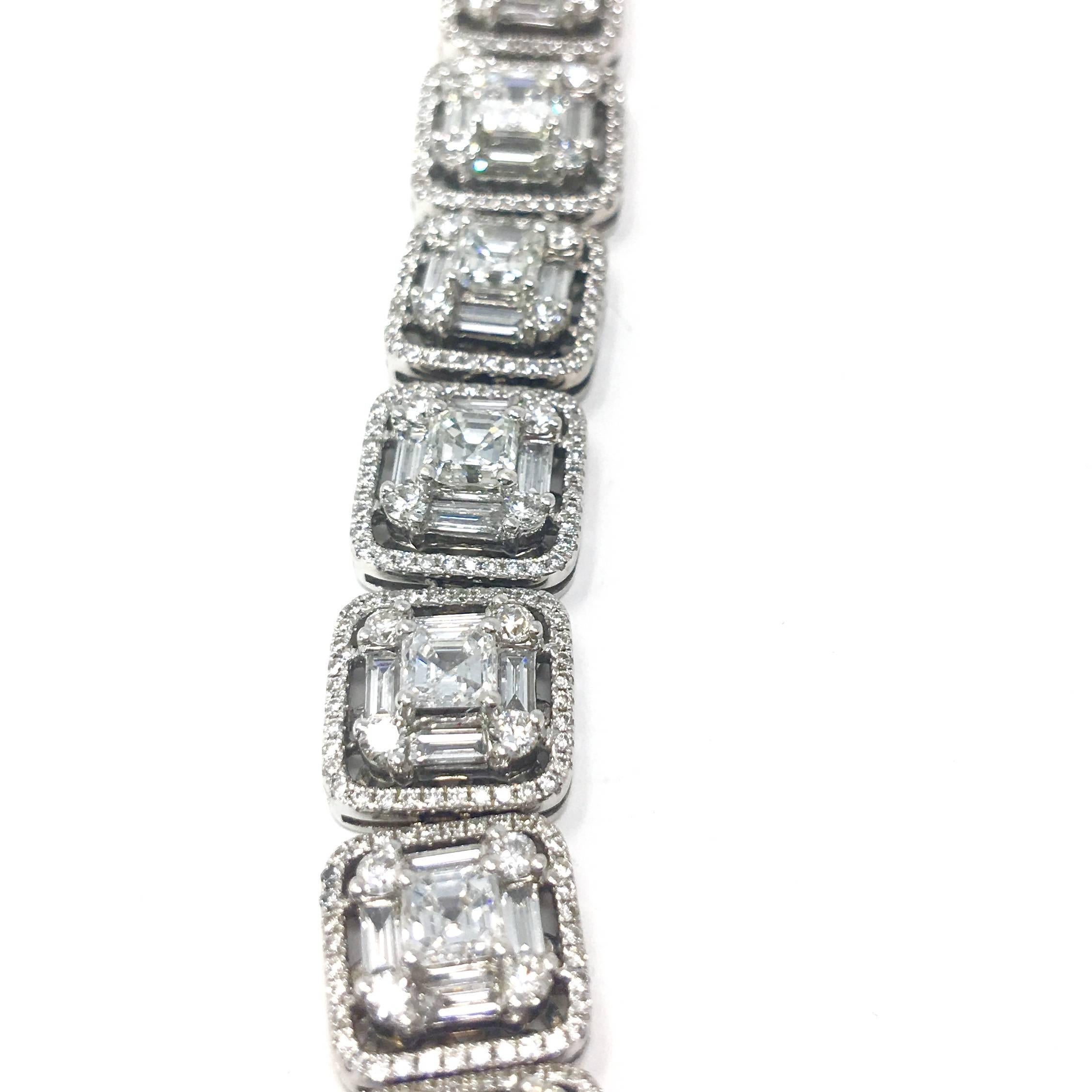 Approximately 18.90 carats of beautiful white diamonds in this line bracelet. The diamonds are a square emerald cut with baguettes and round diamonds in the center. Beautifully made, the diamonds are g-h color and VS+ clarity.  The bracelet is made