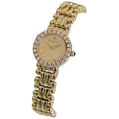 Baume & Mercier Lady's Yellow Gold Diamond Bezel Quartz Dress Wristwatch