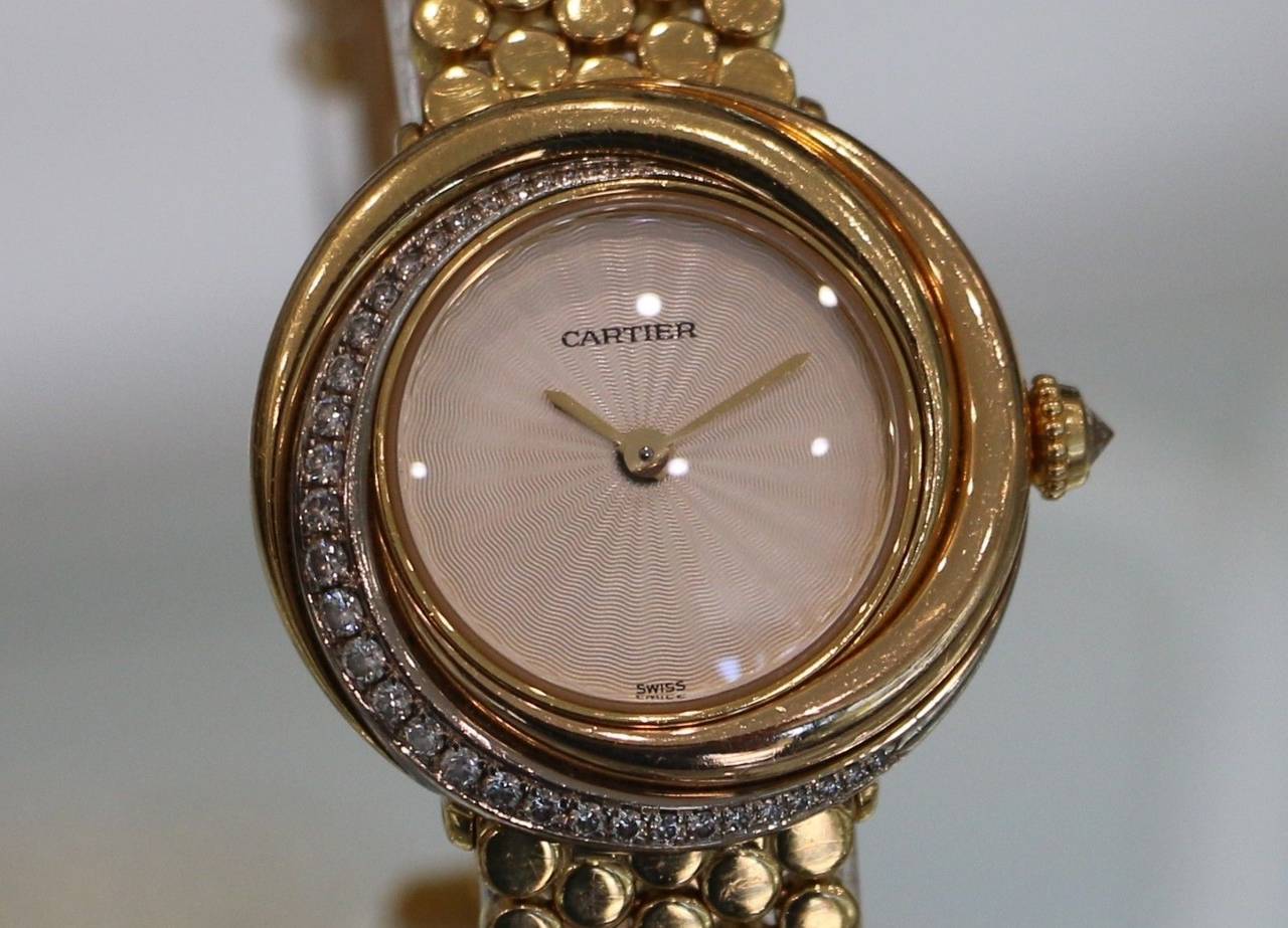 Cartier Lady's Yellow Gold Diamonds Trinity Quartz Wristwatch Ref 2357 In Excellent Condition In Los Angeles, CA