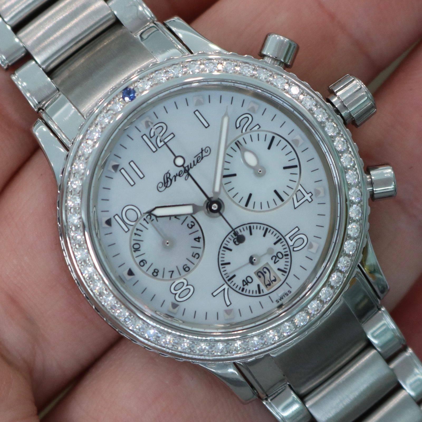Brand Name:  Breguet
Style Number:  4821st/59/s76.d000 
Series:  Type XX Transatlantique
Gender:  Lady's
Case Material:  Stainless Steel
Dial Color:  Blue Mother Of Pearl
Movement:  Automatic
Engine:  Breguet Cal. 550
Functions:  Hours, Minutes,
