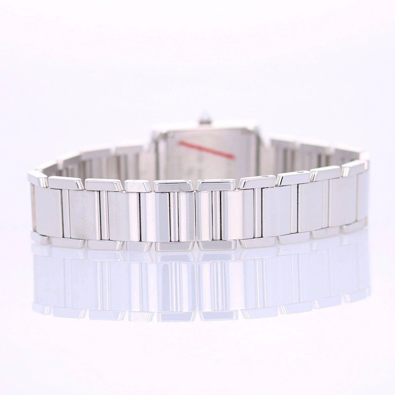 Brand Name 
Cartier 
Style Number 
WE1002S3 
Also Called 
Ref. 2403 
Series 
Tank Francaise 
Gender 
Ladies 
Case Material 
18k White Gold 
Dial Color 
Silver 
Movement 
Quartz 
Functions 
Hours, Minutes 
Crystal Material 
Sapphire 
Case Diameter