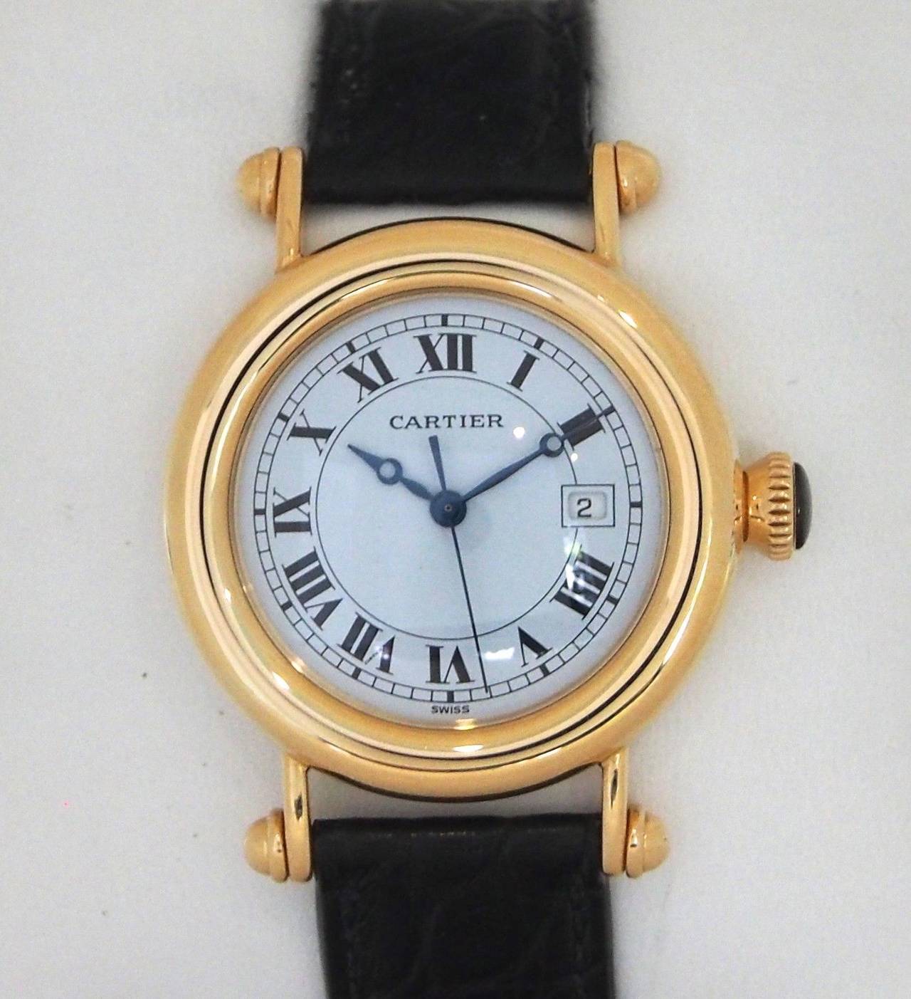 Brand Name  Cartier  
Style Number  Ref. 1420  
Also Called  Diabolo  
Series  Diablo  
Gender  Lady's  
Case Material  18K Yellow Gold   
Dial Color  White  
Movement  Quartz  
Functions  Hours, Minutes  
Crystal Material  Sapphire  
Case