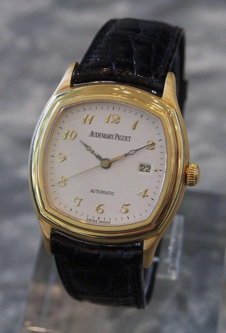Brand: Audemars Piguet
Model: John Shaeffer Automatic
Case Material: 18K Yellow Gold
Dial: White with Gold Breguet Numerals
Movement: Automatic
Functions: Hours, Minutes, Seconds, Date
Crystal: Sapphire
Width: 34mm
Caseback: Solid
Strap