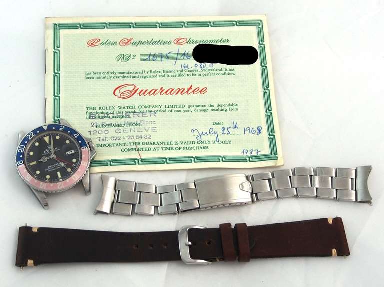 Brand: Rolex
Reference: 1675
Model: GMT-Master, Small Hand
Case Material: Stainless Steel
Dial Color: Black with Creamy Patina
Movement: Automatic, cal. 1575
Case Diameter: 40mm
Bracelet: Stainless steel Rolex USA C+I 78

This GMT-Master,