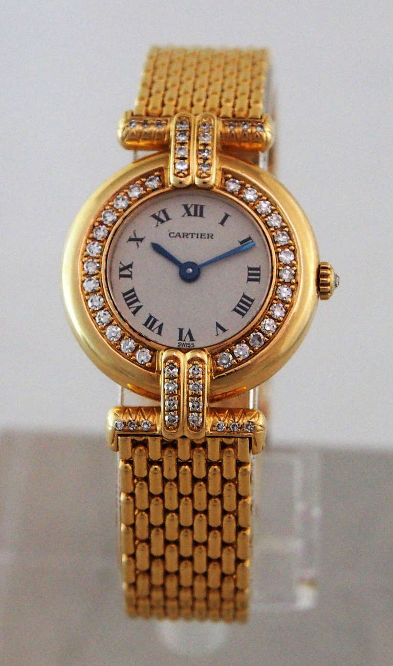Brand Name: Cartier
Gender: Lady's
Series: Colisee
Case Material: 18K Yellow Gold
Dial: Silvered
Movement: Quartz
Functions: Hours, Minutes
Crystal Material: Scratch Resistant Sapphire
Case Diameter: 23.5mm
Caseback: Solid
Bezel Material: