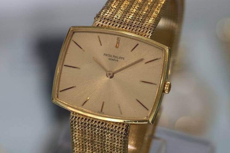 Patek Philippe Yellow Gold Cushion Bracelet Manual Wristwatch Ref 3527 In Excellent Condition For Sale In Los Angeles, CA