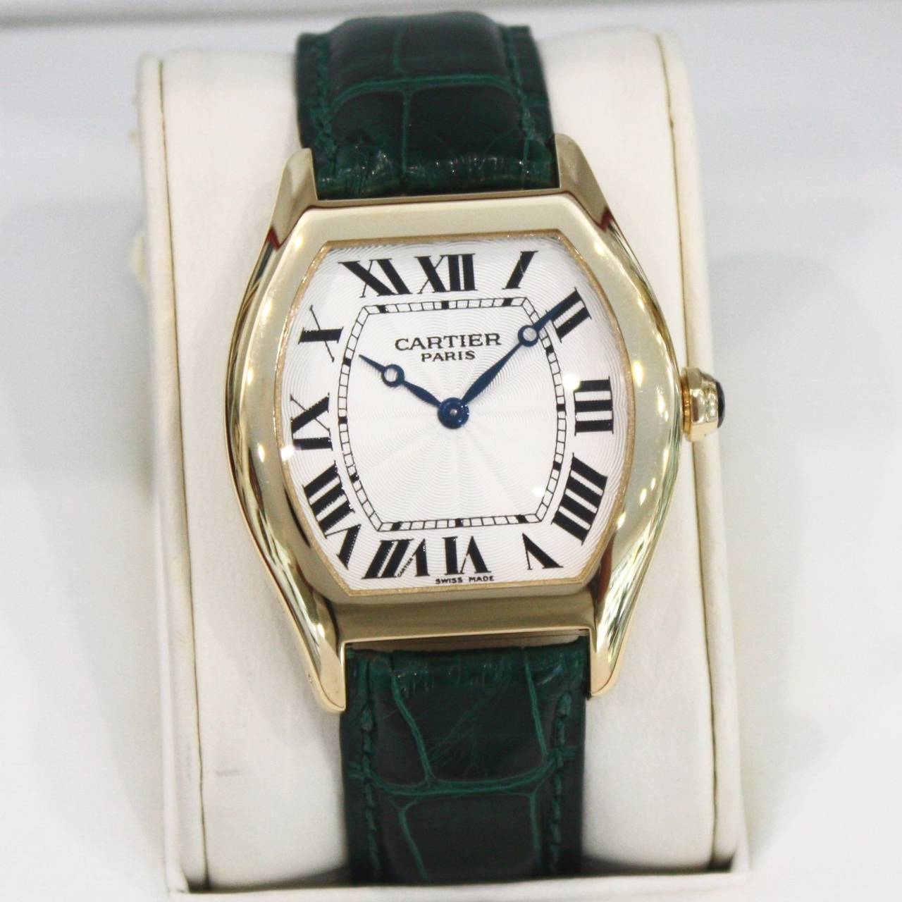 Brand Name	Cartier 
Style Number	2496C
Series	Tortue
Gender	Men's
Case Material	43mm x 35mm 
Dial Color	Silvered w/ Guilloche Finishings
Movement	Mechanical Wind
Engine	Mechanical Manually-Wound Calibre 430MC
Functions	Hours, Minutes