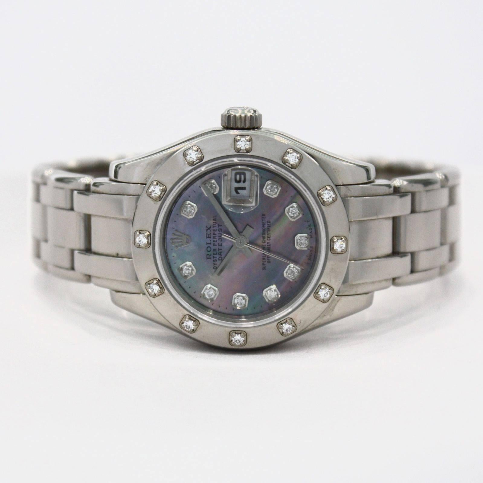 Rolex Ladies White Gold Diamond Black Mother-of-Pearl Pearlmaster Wristwatch In Excellent Condition In Los Angeles, CA