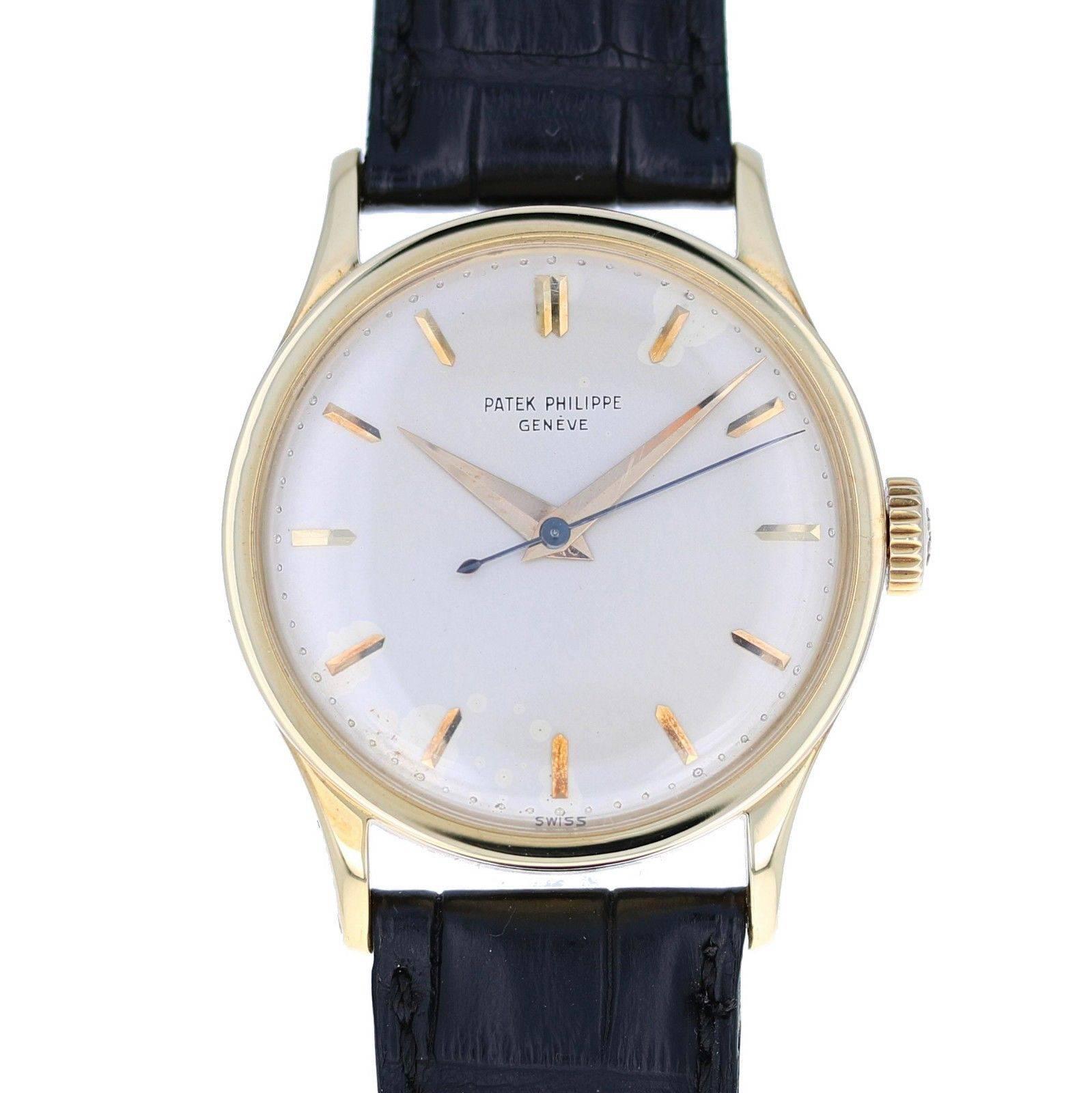 Brand Name	Patek Philippe
Style Number	570J 
Also Called	570
Series	Calatrava
Gender	Men's
Case Material	18k Yellow Gold
Dial Color	Gilt Sunburst
Movement	Mechanical Wind
Engine	Cal. 27 SC - 18 Jewels
Functions	Hours, Minutes, Seconds
Crystal