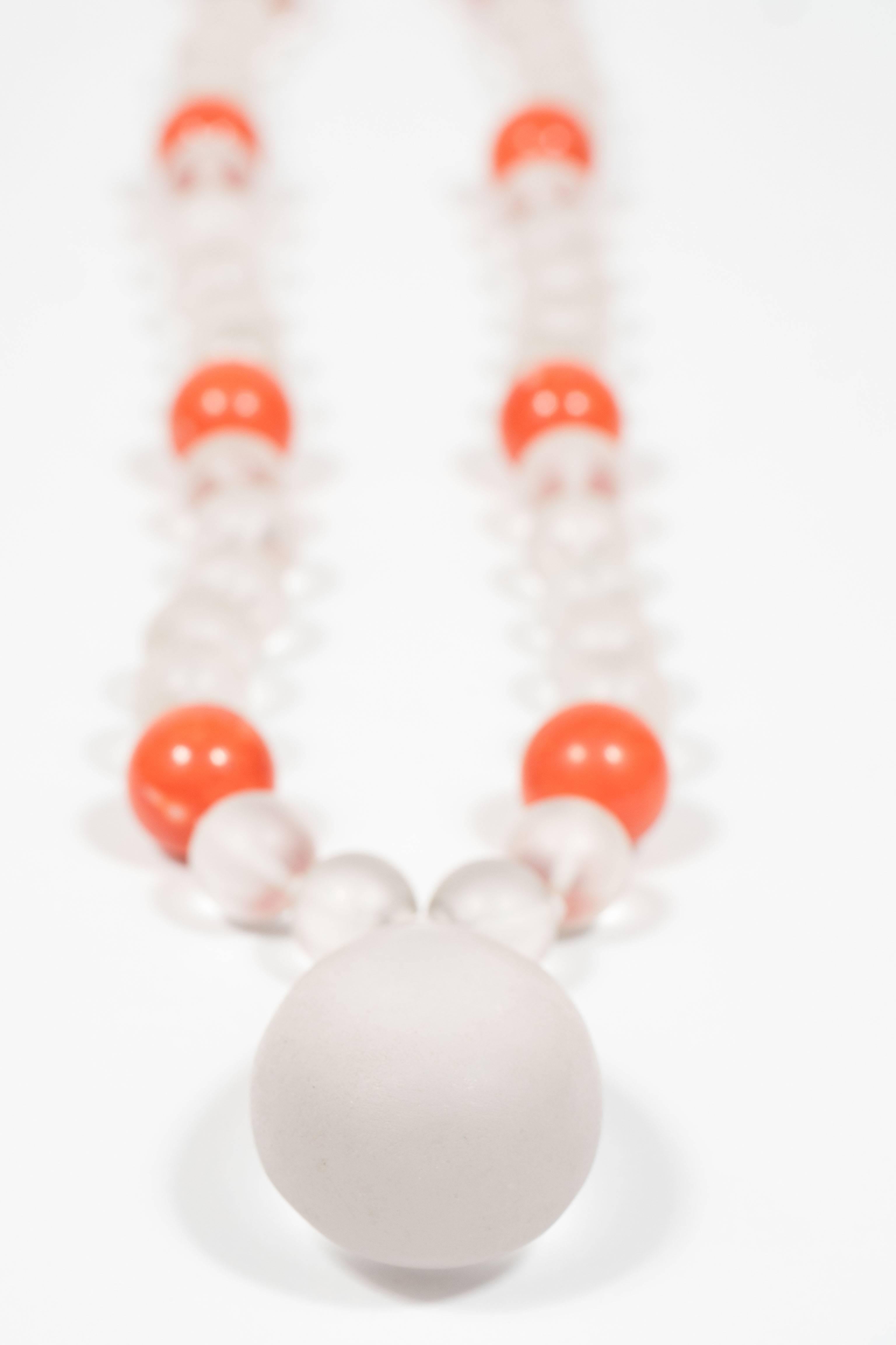 Composed of 48 frosted rock crystal beads alternating with ten coral beads suspending a frosted rock crystal drop.  Estimated Value by Sotheby's 10,000 to 15,000. Newly restrung and excellent condition.
American
Circa 1968
18.75 inches