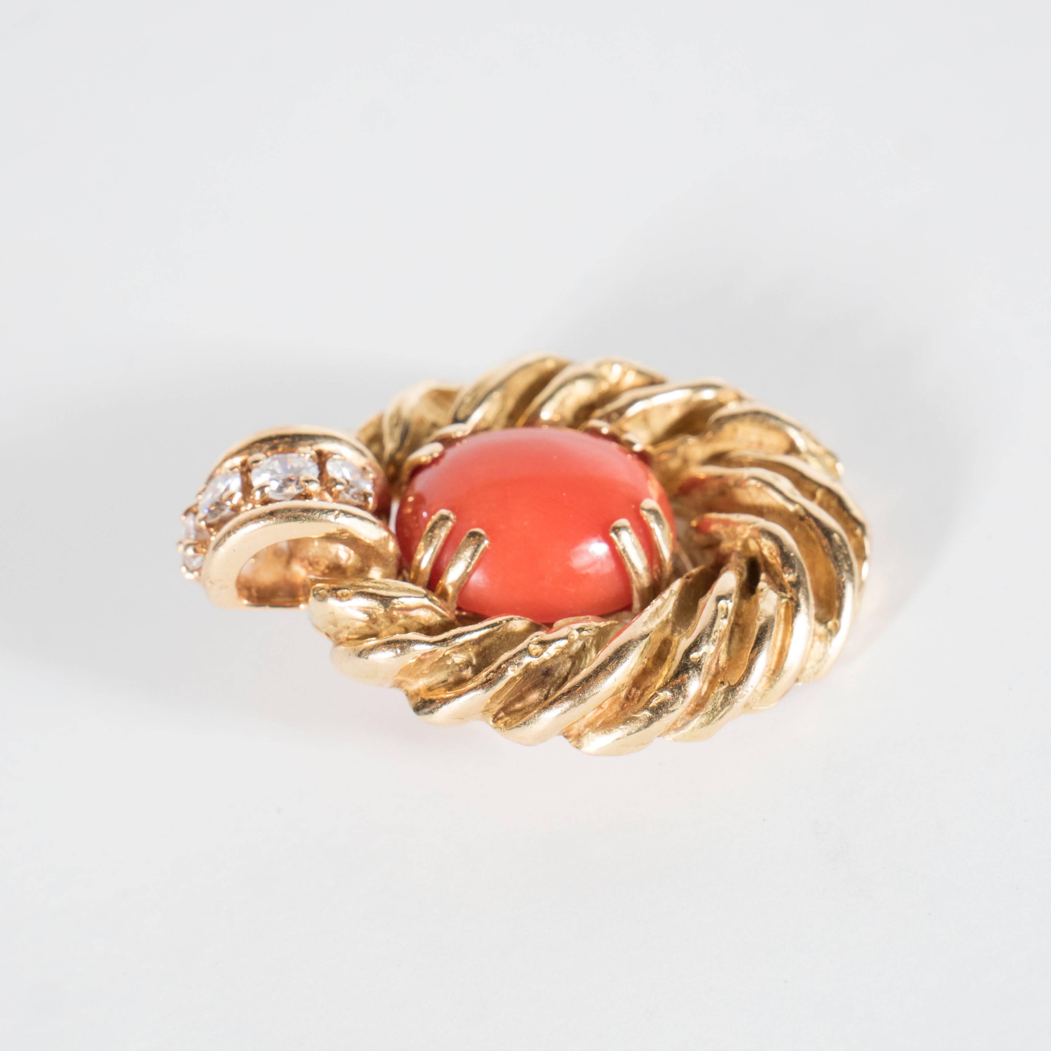 A stunning pair of Mid-Century twisted rope design earrings set made of 18 k yellow gold each set  with oval coral and 4 full cut diamonds .These are marked Chaumet Paris .They are exquisitely made and weigh 36 grams.