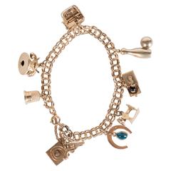 Mid-Century Classic Eight Charm Gold Link Bracelet 2