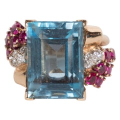 Vintage 1940s American 8 Carat Acquamarine and 14k Gold Ring with Rubies and Diamonds