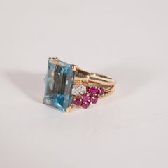 1940s American 8 Carat Acquamarine and 14k Gold Ring with Rubies and Diamonds