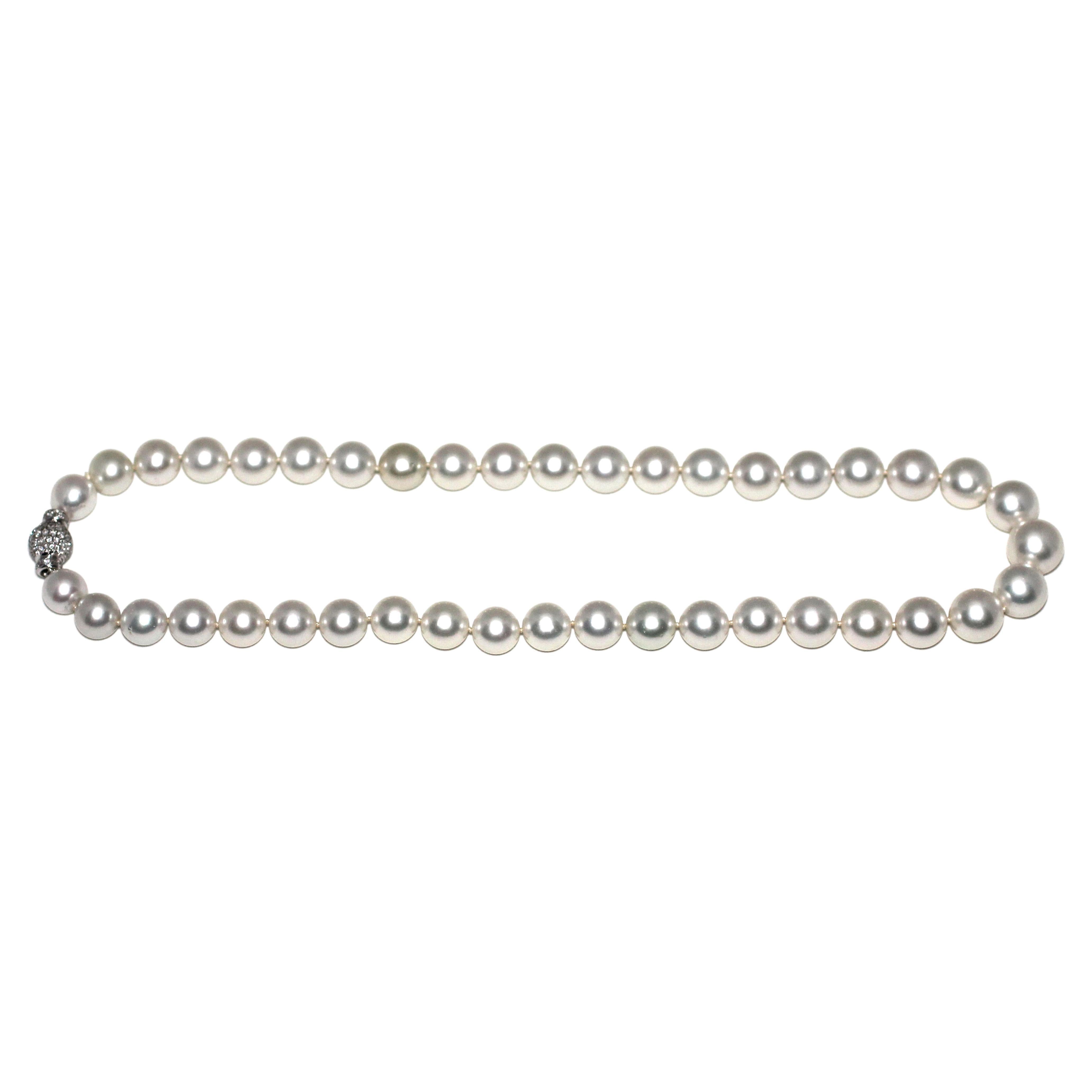 12mm Full diamond Clasp 
18K White Gold High Polish
Round Brilliant Colorless Diamond
57 Round South Sea Cultured Pearl 13.25-17.5 mm
Total Item Weight (g): 231.5
Hue: Pink
Orient: Excellent
Luster: Excellent
Surface: Very Lightly Spotted
Nacre: