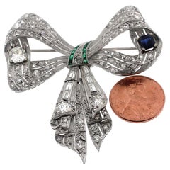 Vintage Jewel Of Ocean Estate Platinum Diamonds, Sapphire and Emerald Bow Brooch Pendent