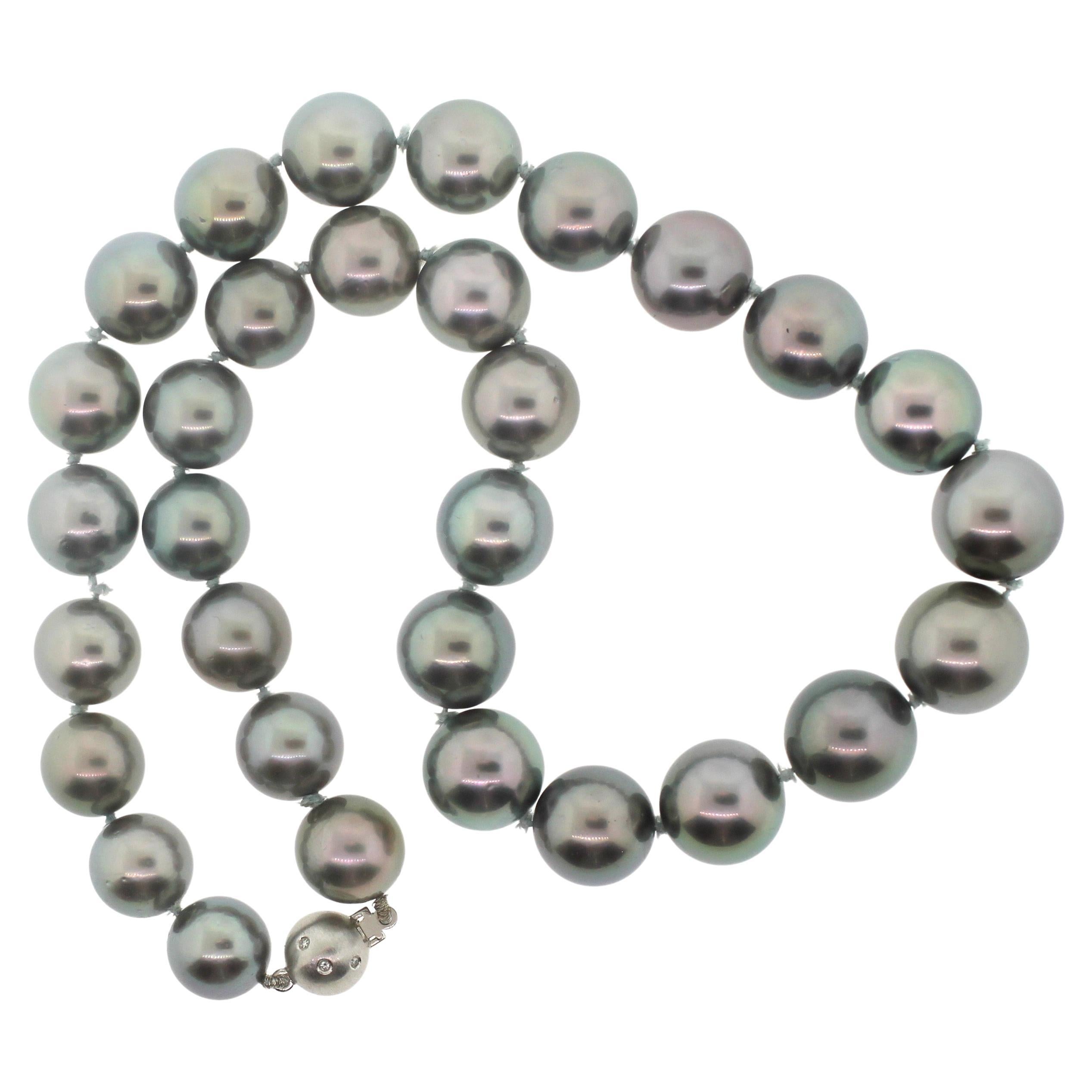Hakimoto By Jewel Of Ocean 18K South Sea Strand Necklace
18K White Gold  With Diamonds
Weight (g): 82.3
Cultured Tahitian South Sea Pearl 
Pearl Size: 13X11mm 
Pearl Shape: Round 
Body color: Silver Gray
Orient: Very Good
Luster: Very Good 
Surface: