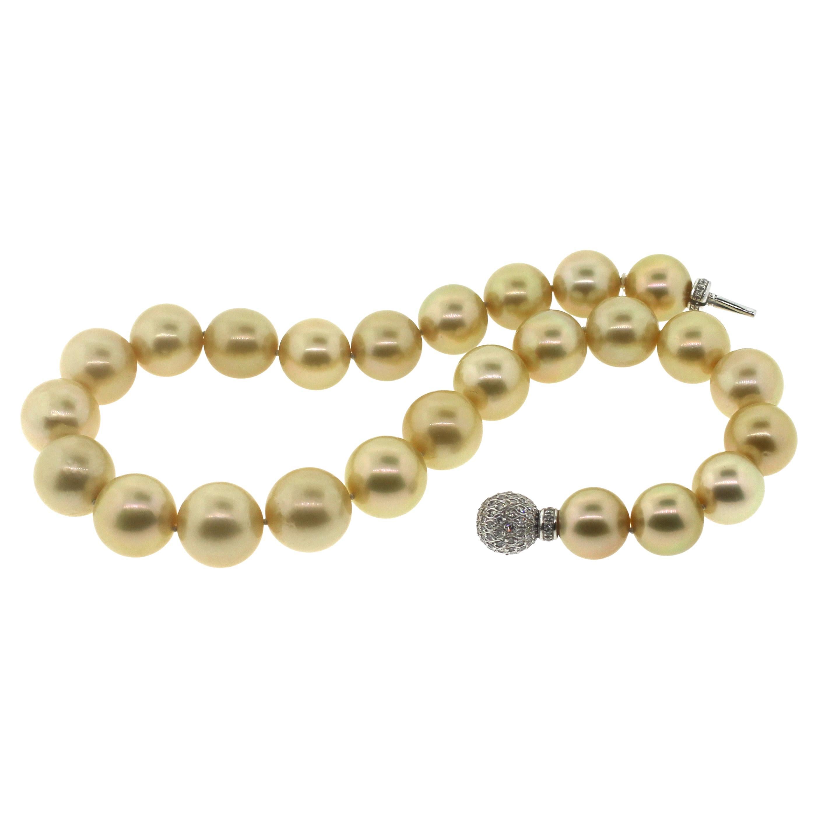 Hakimoto By Jewel Of Ocean 18K South Sea Strand Necklace
18K White Gold Approx. 3Carts Diamonds Clasp 
Weight (g): 129.8
Cultured Natural color Golden South Sea Pearl 
Pearl Size: 16X14mm 
Pearl Shape: Round 
Body color: Golden
Orient: Very