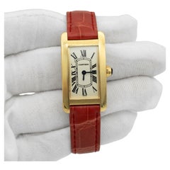 Reloj de mujer Cartier Tank Americaine W2601556, con correa de piel, oro amarillo de 18 quilates y esfera plateada