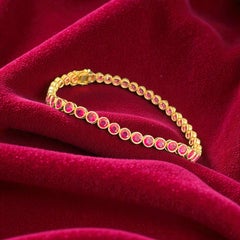 13.50 Carats Natural Ruby Bezel-Set Tennis Bracelet in 18K Yellow Gold