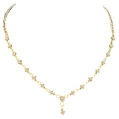 1.12 Cts F/VS1 Round Brilliant Diamonds Floral Star Tennis Necklace in 14K Gold