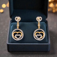 0.92 Cts F/VS1 Round Brilliant Diamonds Pavé Heart Dangle Earrings in 14K Gold