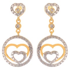 0.92 Cts F/VS1 Round Brilliant Diamonds Pavé Heart Dangle Earrings in 14K Gold