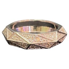 1.18 Carats F/VS1 Round Brilliant Diamonds Pavé Torqued Faceted Ring in 14K Gold