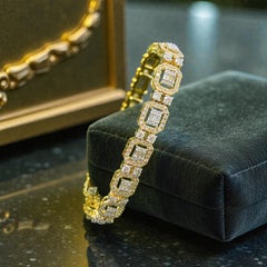 5.10 Cts F/VS1 Round and Baguette Diamonds Pavé Halo Tennis Bracelet in 14K Gold