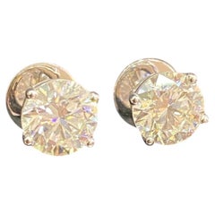 GIA Certified 4 Cts Round Brilliant D/VS1 Diamonds Stud Earrings 18K White Gold