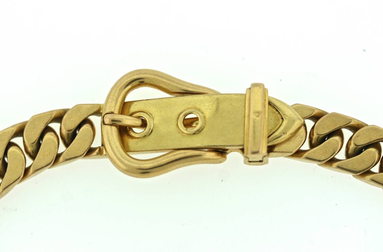 Hermes 18k gold curb link chain with a functional buckle closure. The buckle motif is iconic for the Houde of Hermes and the weight of this piece lends a very industrial and utilitarian feel. I love everything about it! 16