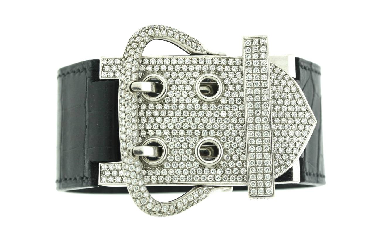 Hermes, Paris 18k white gold and diamond buckle bracelet with black matte crocodile strap. Approximate diamond weight 5.5 carats. 

7.5 or 7