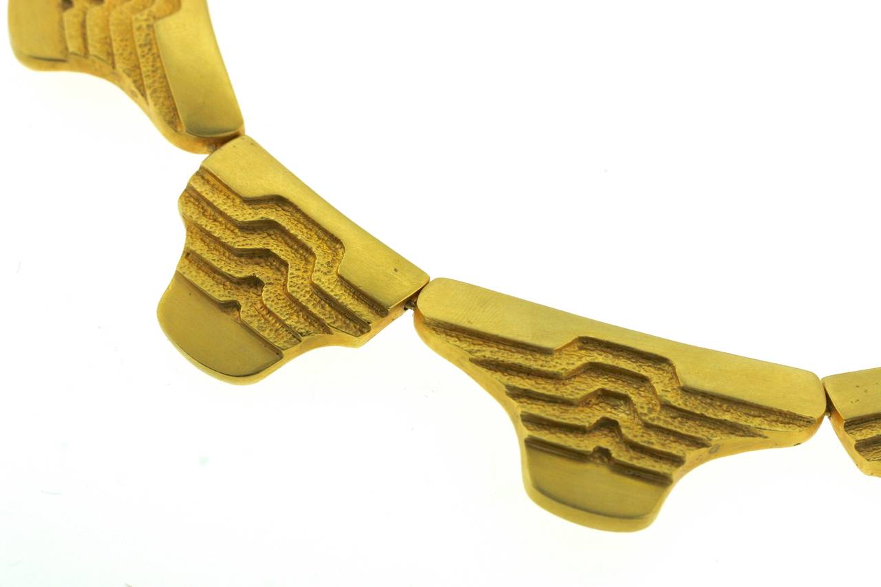 Lalaounis  stylish 18k gold collar designed as links of stepped levels in both textured and smooth surfaces. 15