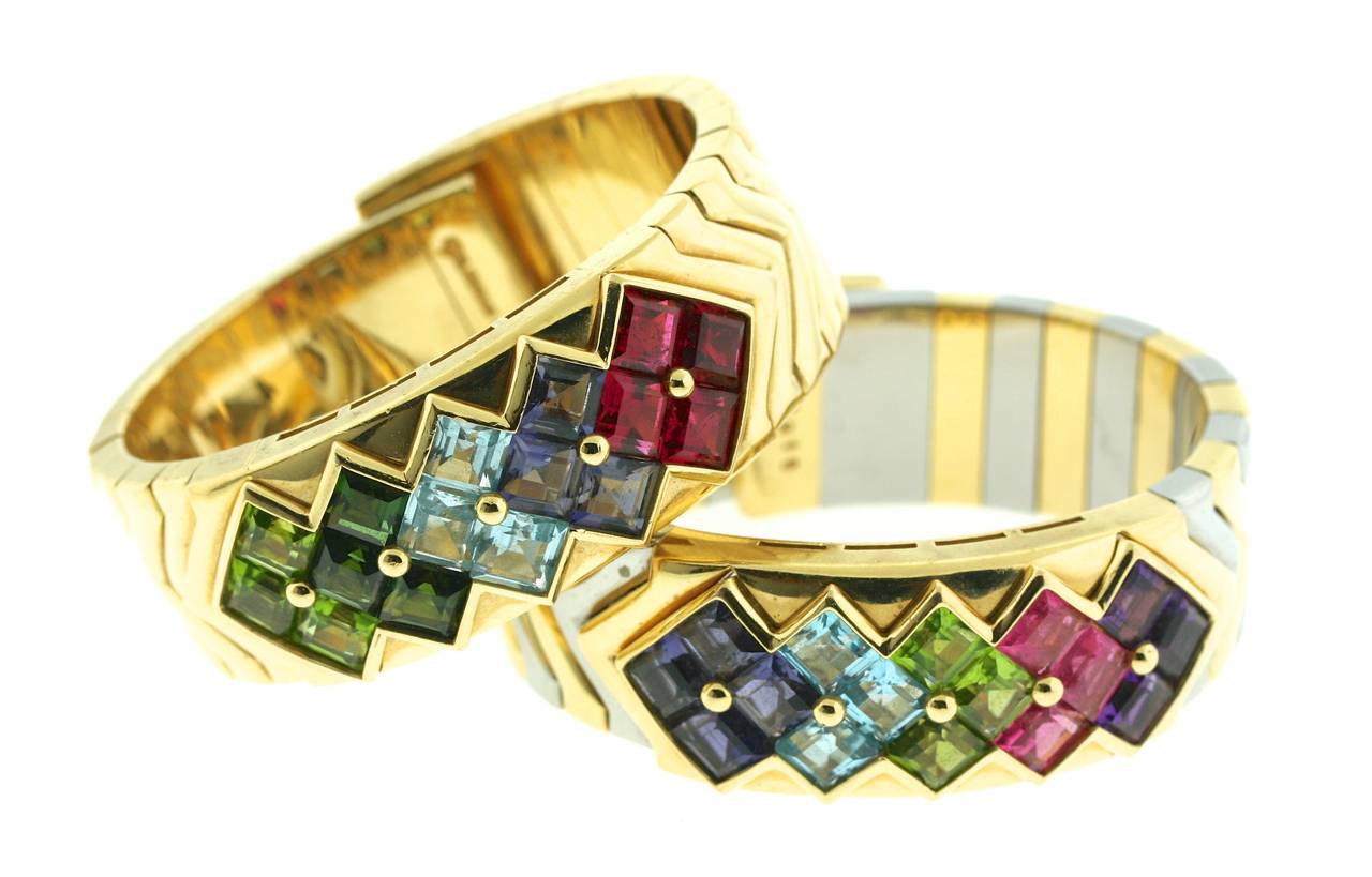 A quintessential pair of Bulgari cuff bracelets from the Carre collection circa 1980. During this period of jewelry production at Bulgari calibre cut stones, fashionable in the 1920s, had a resurgence in popularity.  These stones were cut