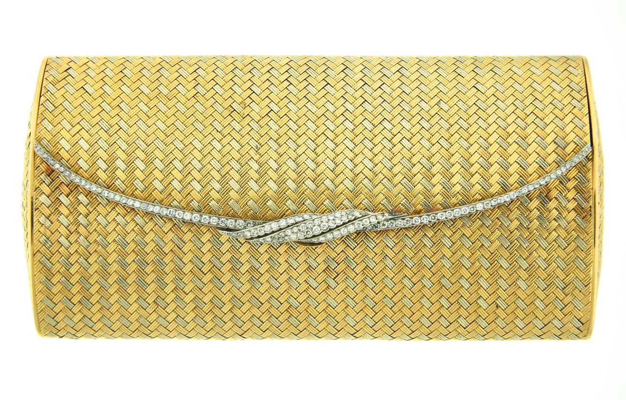 woven gold clutch