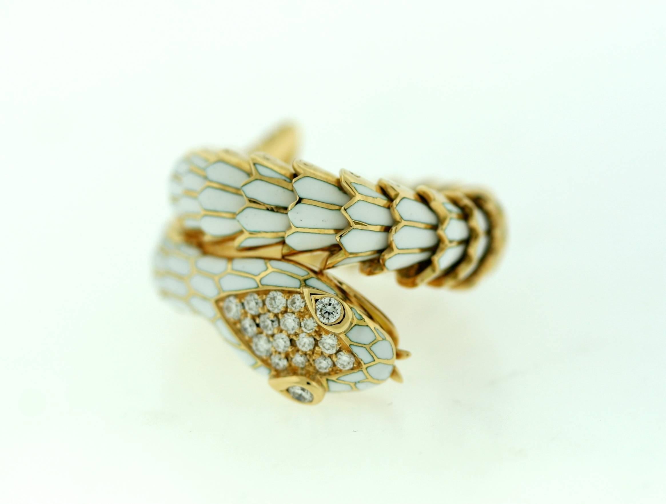 Illario 18k gold white enamel coiled serpent ring with pave set diamond head and tail. Size is flexible as ring has a tension coil. Circa 1970s.