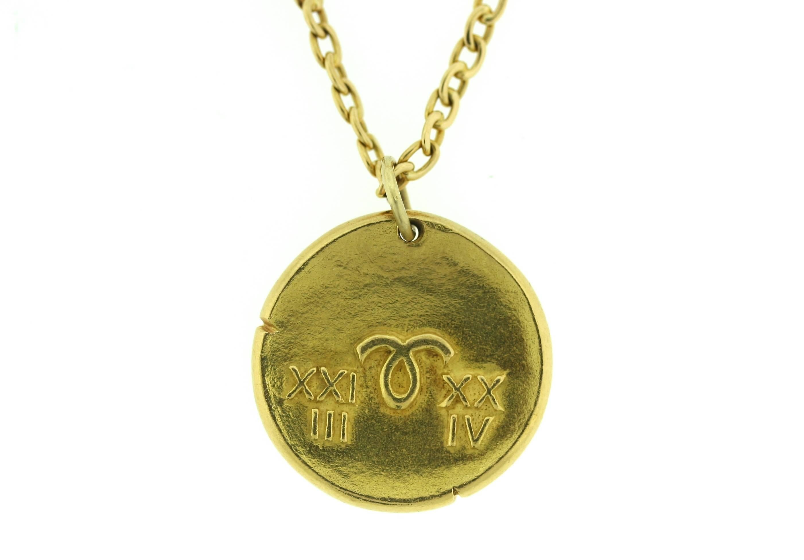 Van Cleef & Arpels 18k gold Aries zodiac pendant suspended from a VCA 18k gold chain. Pendant is 1