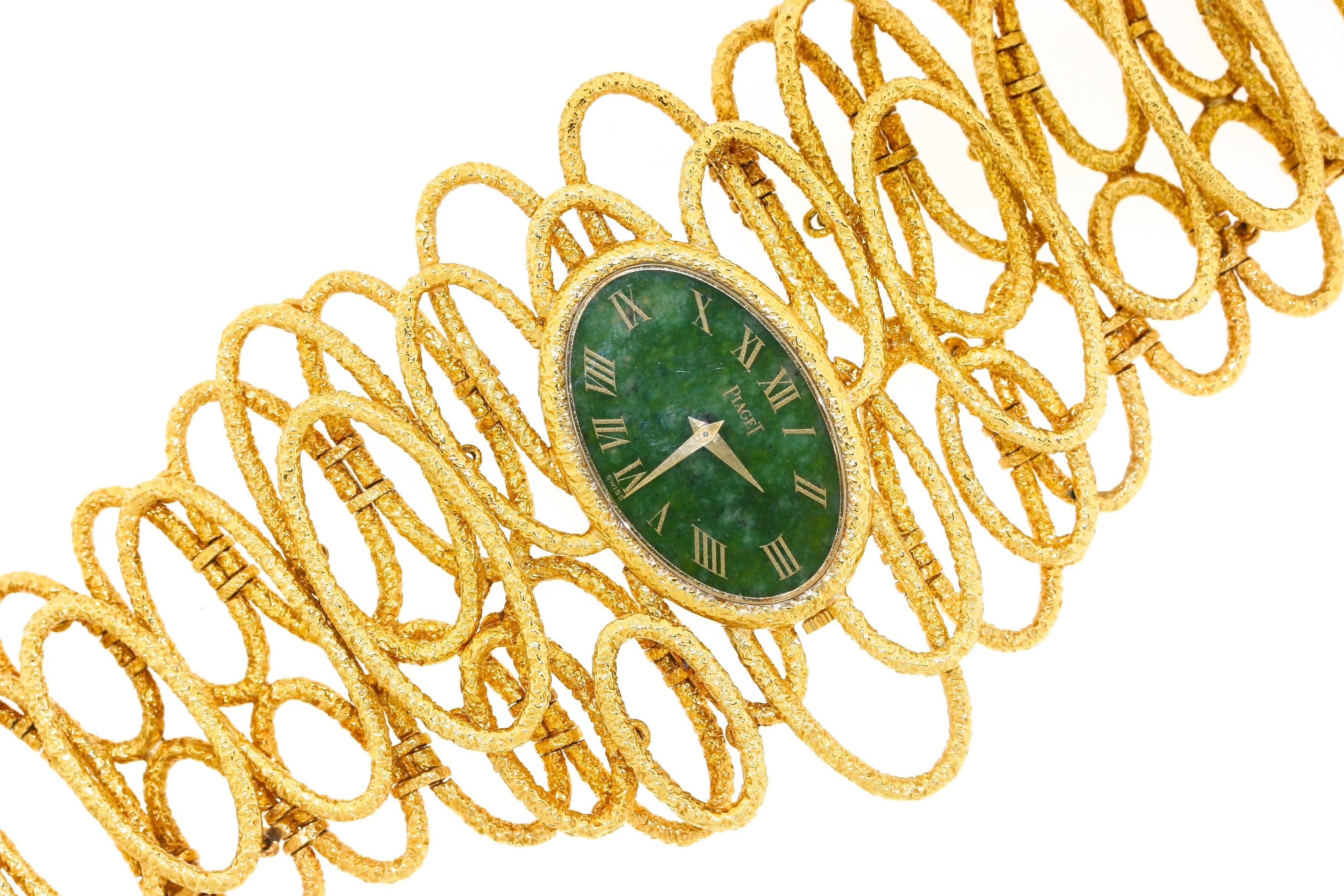 Piaget textured 18k gold bracelet watch designed as a series of overlapping oval links centering a nephrite jade dial. This type of design for Piaget was unique to the late 1960s and early 1970s. The use of hard stones such as jade, tiger eye,
