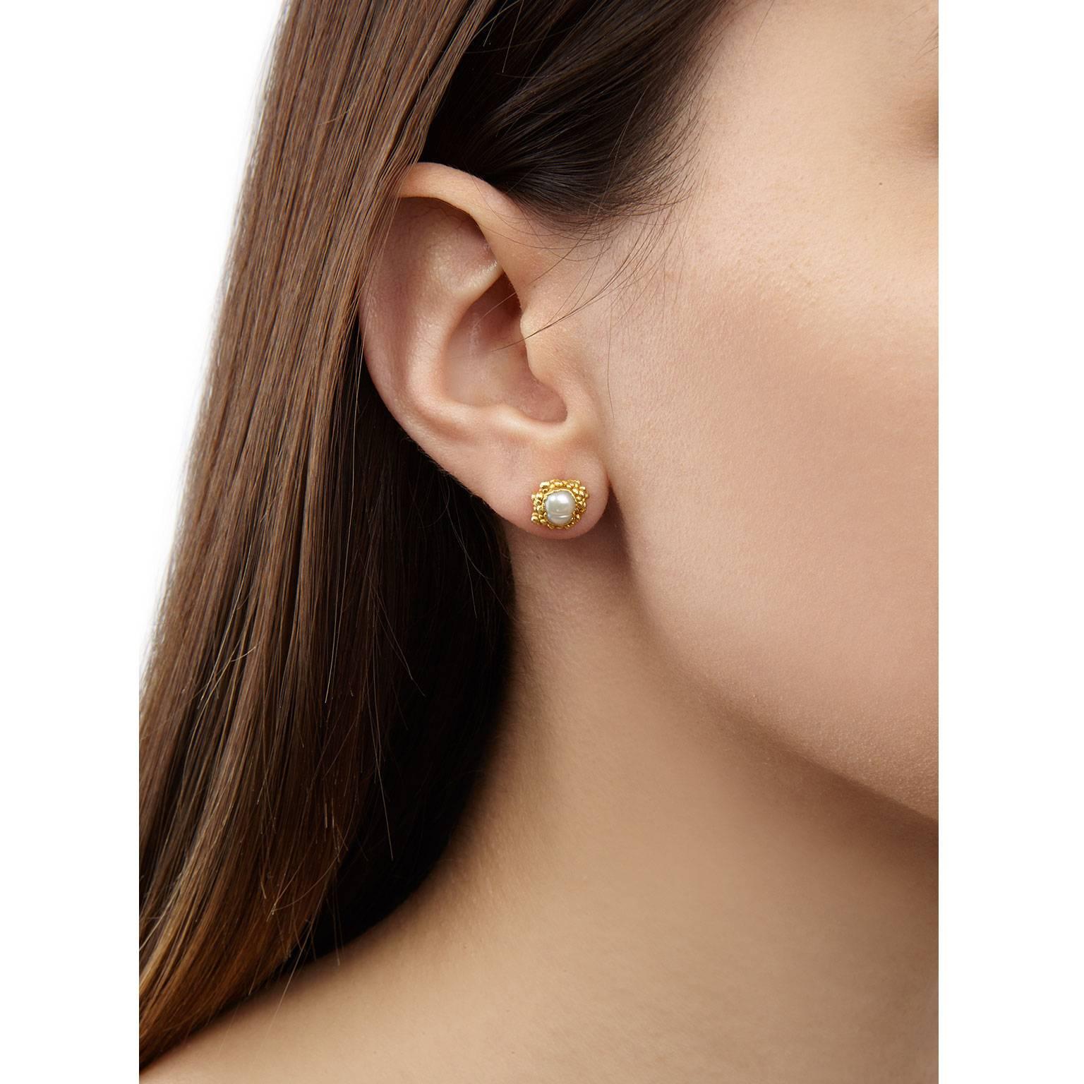 Perfect for everyday wear, the Ursula studs feature beautiful white freshwater baroque pearls encrusted in granules of gold plated silver.

Pearls may vary in size and shape as each one is unique.

Handmade in London, England.
