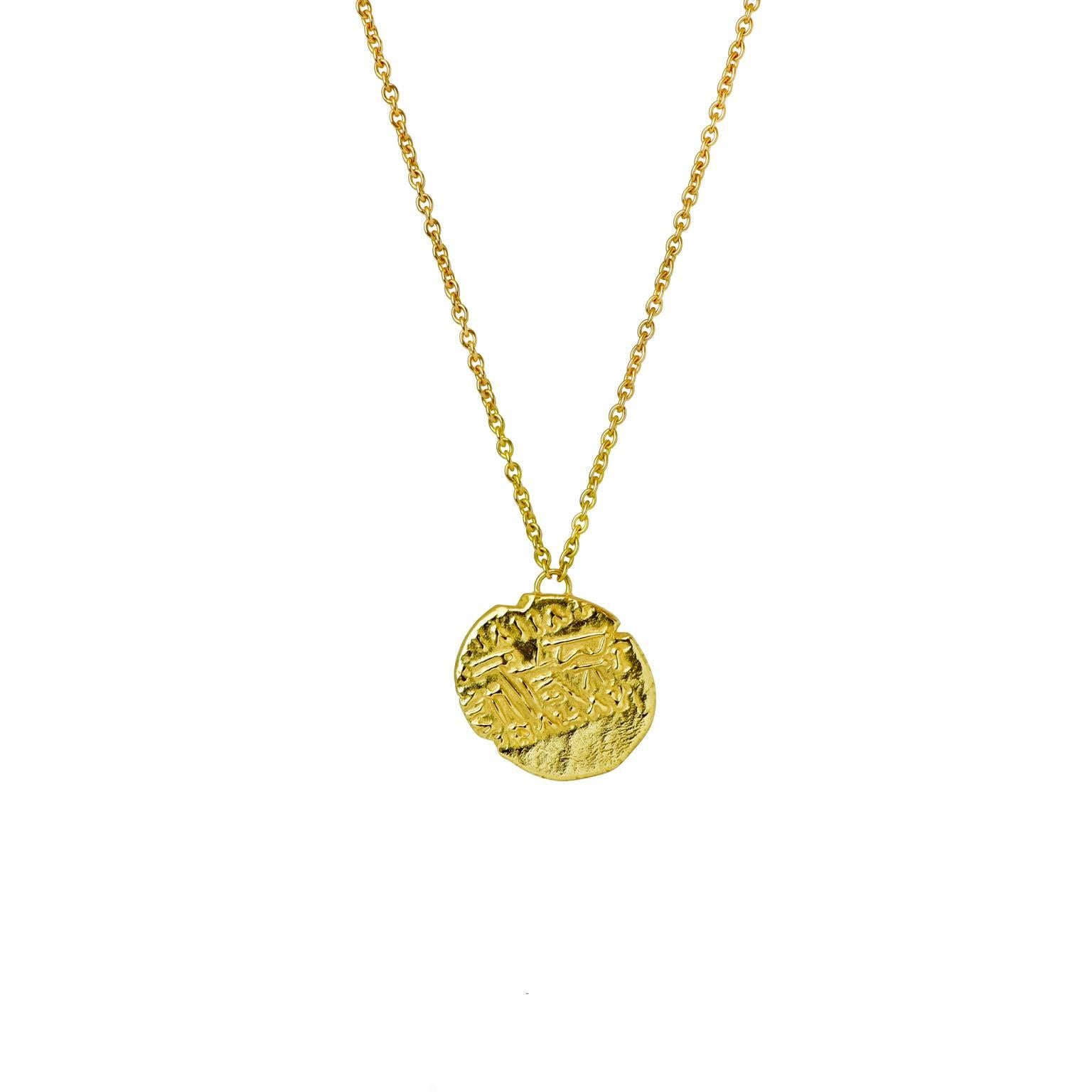 Depicting one of the many Kings of this ancient Iranian empire, the Parthian coin pendant hangs on a fine trace chain. The reverse side features an archer seated right on a throne, holding a bow. Worth its weight in gold, wear this eye catching