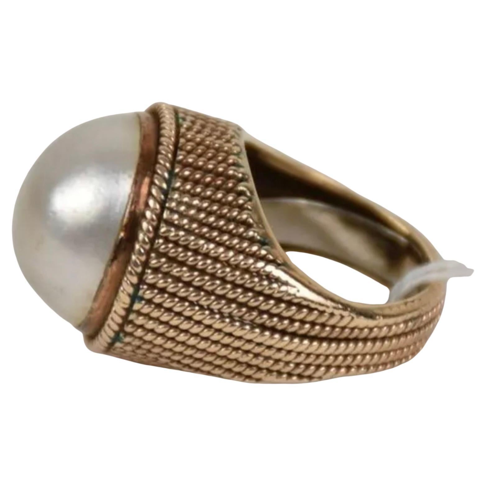 14k white gold huge Mabe Pearl ring. 15.41 Grams TW. The pearl dimensions are approximately 15 mm x 18 mm. 
Approximately 20 carats!! Tested 14k. Approximate size 6.5