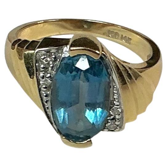 John C Rinker Blue Topaz 14K Yellow Gold and Diamond Ring